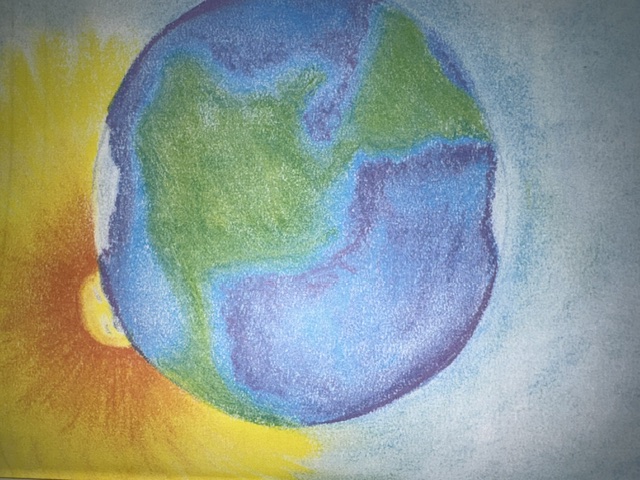 Anne's illustration of the sun rising behind the Earth